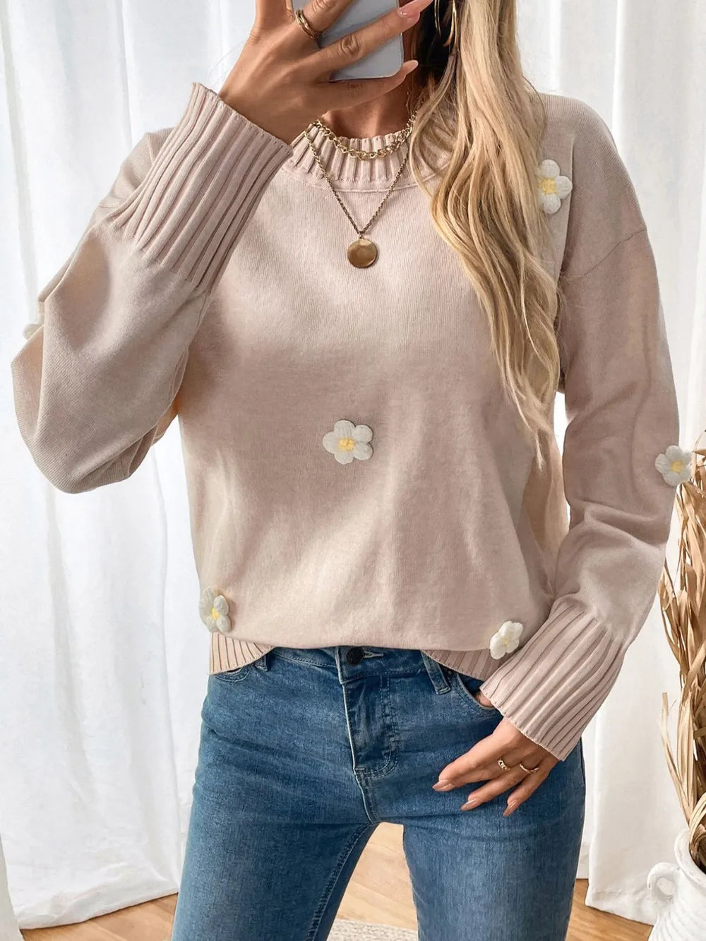 Pull à manches longues et col rond avec motif fleuri
