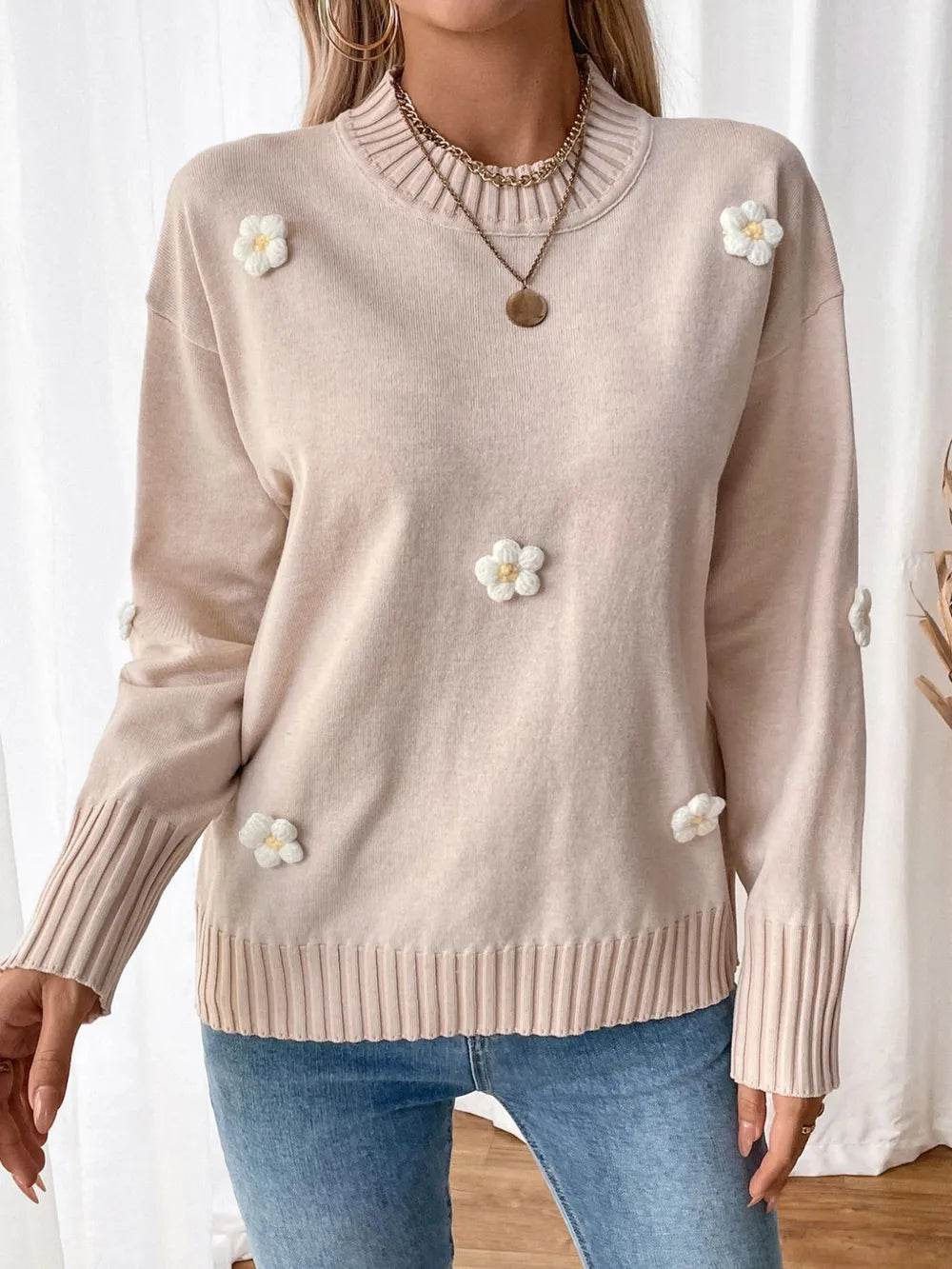 Pull à manches longues et col rond avec motif fleuri
