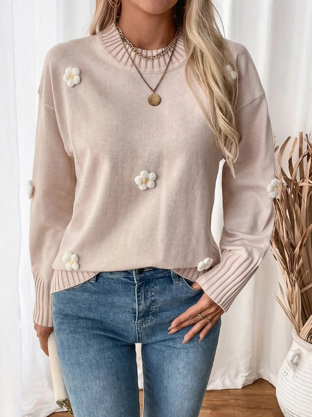 Pull à manches longues et col rond avec motif fleuri